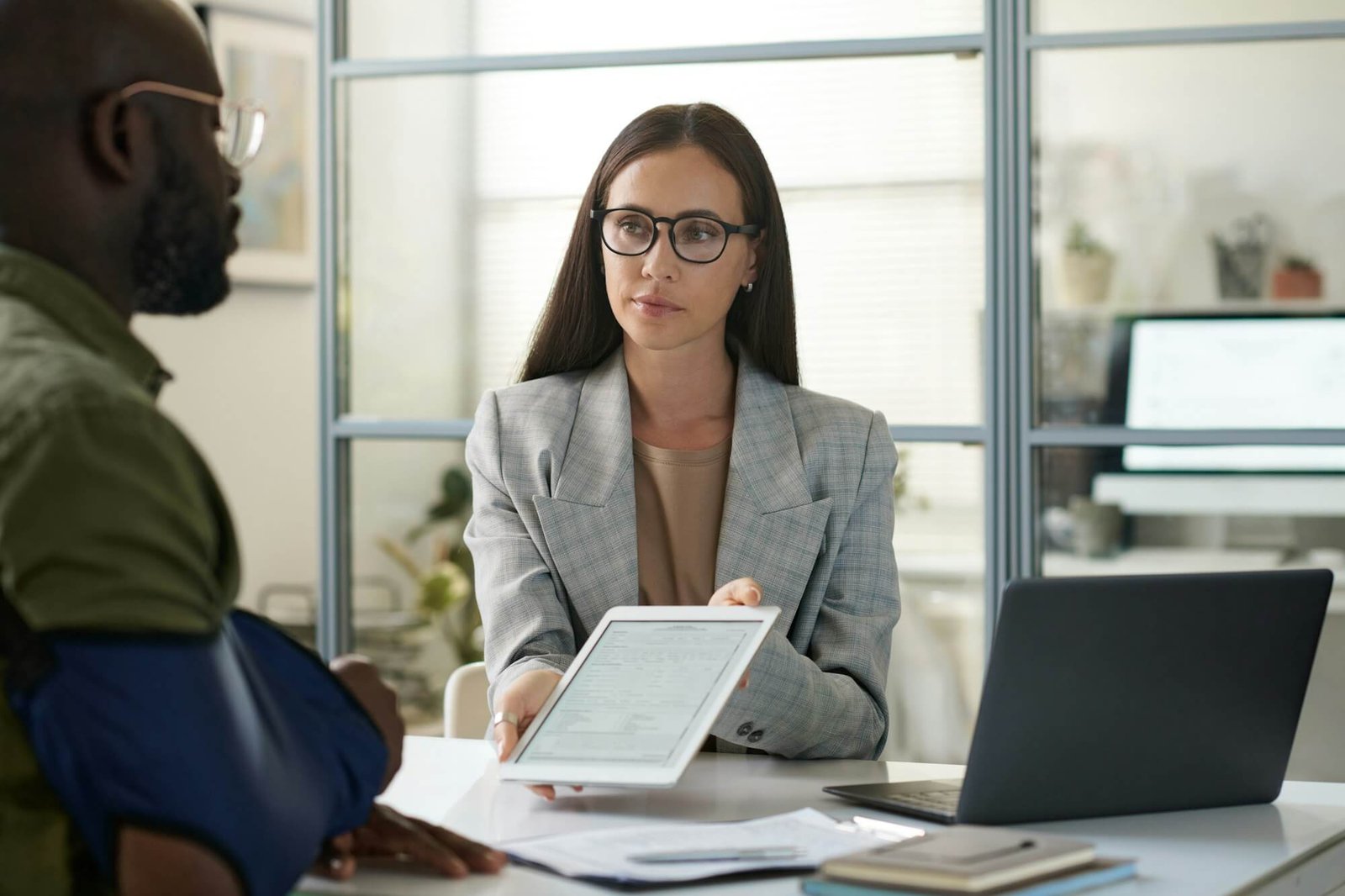 insurance-agent-signing-contract-with-client.jpg